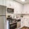 a kitchen with white cabinets